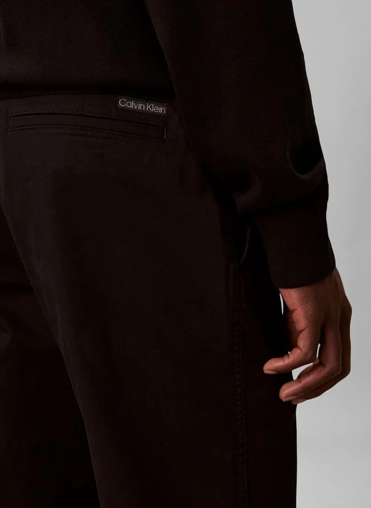 Calvin Klein Jeans  Slim Fit Buttoned Chinos for Men | Best Price UAE